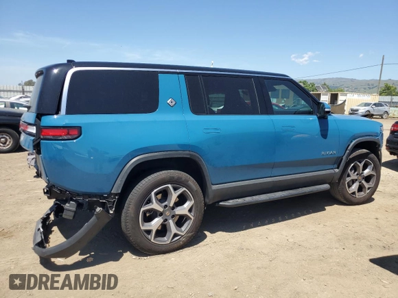 2024 Rivian R1S Adventure z VIN 7PDSGBBA0RN034793, wystawiony jako Copart lot #55091885 z przebiegiem 20 154 mil mil oraz Szkody całkowita. Historia ofert i sprzedaży dostępna na DreamBid. Obrazek 3.