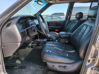 1998 Jeep Grand Cherokee Limited z VIN 1J4GZ88Z8WC306919, wystawiony jako Copart lot #61505725 z przebiegiem 195 329 mil mil oraz Czysty tytuł • Clean title. Historia ofert i sprzedaży dostępna na DreamBid. Obrazek 7.