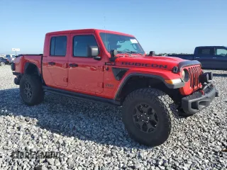 2020 Jeep Gladiator Rubicon with VIN 1C6JJTBG4LL117104, listed as a Copart auction lot 62068545 with 148,294 mi miles and Non repairable. Bid and sale history available at DreamBid. Image 4.