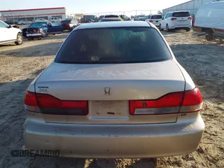 2002 Honda Accord EX z VIN 1HGCG16522A065397, wystawiony jako IAAI lot #41790485 z przebiegiem 223 389 mil mil oraz . Historia ofert i sprzedaży dostępna na DreamBid. Obrazek 16.