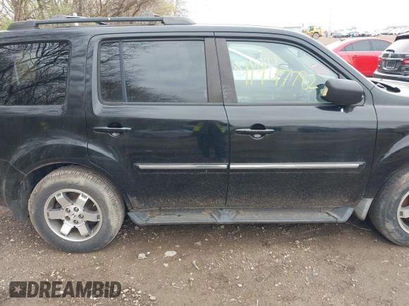 2009 Honda Pilot Touring with VIN 5FNYF48959B016978, listed as a IAAI auction lot 41947782 with 234,115 mi miles and . Bid and sale history available at carsss.com. Image 13.