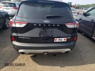 2020 Ford Escape Titanium z VIN 1FMCU9J97LUB25055, wystawiony jako Copart lot #60326945 z przebiegiem 78 711 mil mil oraz Szkoda całkowita • Salvage title. Historia ofert i sprzedaży dostępna na DreamBid. Obrazek 6.