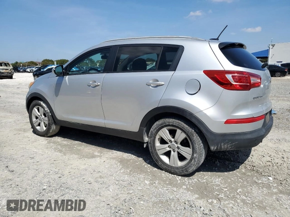 2013 Kia Sportage LX with VIN KNDPB3A26D7429389, listed as a Copart auction lot 50597295 with 217,197 mi miles and Salvage Title. Bid and sale history available at carsss.com. Image 2.