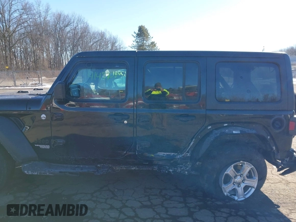 2021 Jeep Wrangler Unlimited Sport Altitude with VIN 1C4HJXDG8MW814044, listed as a IAAI auction lot 41437281 with 54,293 mi miles and . Bid and sale history available at DreamBid. Image 14.