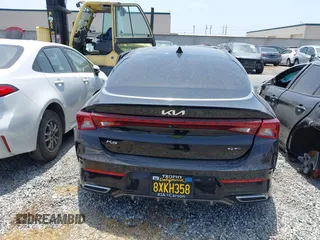 2022 Kia K5 GT-Line z VIN 5XXG64J2XNG095158, wystawiony jako IAAI lot #42163963 z przebiegiem 59 756 mil mil oraz . Historia ofert i sprzedaży dostępna na DreamBid. Obrazek 17.