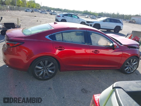 2018 Mazda 6 Grand Touring with VIN JM1GL1TY1J1302146, listed as a IAAI auction lot 41788881 with 55,852 mi miles and . Bid and sale history available at DreamBid. Image 14.