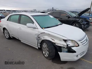 2005 Toyota Avalon XL with VIN 4T1BK36B95U051814, listed as a IAAI auction lot 41052486 with 377,410 mi miles. Bid and sale history available at carsss.com. Image 1.