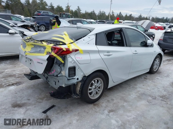 2021 Toyota Prius LE with VIN JTDKAMFP5M3181120, listed as a IAAI auction lot 41623588 with 83,809 mi miles and . Bid and sale history available at DreamBid. Image 4.