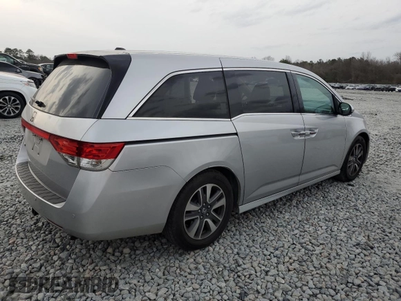 2014 Honda Odyssey Touring with VIN 5FNRL5H90EB096137, listed as a Copart auction lot 47192275 with 164,620 mi miles and Salvage Title. Bid and sale history available at DreamBid. Image 3.