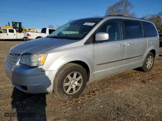 2010 Chrysler Town & Country Touring with VIN 2A4RR5D12AR451235, listed as a Copart auction lot 49587445 with 252,999 mi miles and Salvage Title. Bid and sale history available at carsss.com. Image 1.