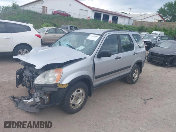 2002 Honda CR-V LX z VIN JHLRD78562C081322, wystawiony jako IAAI lot #42452985 z przebiegiem 193 011 mil mil oraz . Historia ofert i sprzedaży dostępna na DreamBid. Obrazek 18.