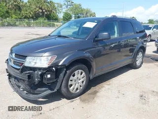 2017 Dodge Journey SE with VIN 3C4PDCAB2HT579852, listed as a IAAI auction lot 42008261 with 112,234 mi miles and . Bid and sale history available at DreamBid. Image 17.