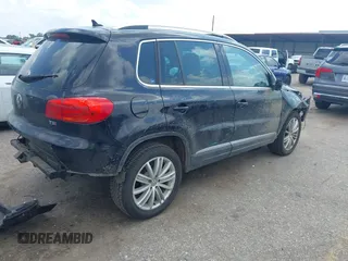 2016 Volkswagen Tiguan R-Line with VIN WVGAV7AX4GW602817, listed as a IAAI auction lot 42460344 with 124,612 mi miles and . Bid and sale history available at DreamBid. Image 4.