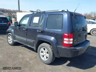 2011 Jeep Liberty Sport 70th Anniversary with VIN 1J4PN2GKXBW539030, listed as a IAAI auction lot 41913633 with 115,605 mi miles. Bid and sale history available at carsss.com. Image 3.