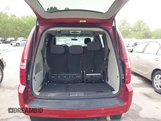 2010 Dodge Grand Caravan SXT z VIN 2D4RN5D19AR258407, wystawiony jako IAAI lot #42072185 z przebiegiem 205 424 mil mil oraz . Historia ofert i sprzedaży dostępna na DreamBid. Obrazek 18.