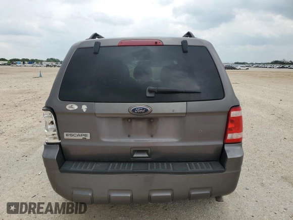 2010 Ford Escape XLT с VIN 1FMCU0D72AKD21676, выставлен на аукционе Copart как лот 55268255 с пробегом 172 355 миль миль и Списание • Salvage title. История ставок и продаж доступна на DreamBid. Изображение 6.