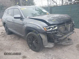 2019 Volkswagen Atlas SEL with VIN 1V2MR2CAXKC606820, listed as a IAAI auction lot 41174864 with 157,416 mi miles and . Bid and sale history available at DreamBid. Image 1.