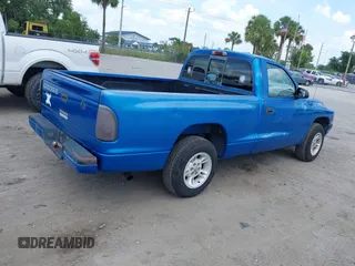 2000 Dodge Dakota z VIN 1B7FL26X1YS799143, wystawiony jako IAAI lot #42303206 z przebiegiem 148 576 mil mil oraz . Historia ofert i sprzedaży dostępna na DreamBid. Obrazek 4.
