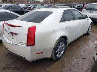 2009 Cadillac CTS AWD w/1SB with VIN 1G6DS57V890123958, listed as a IAAI auction lot 41056440 with 160,288 mi miles. Bid and sale history available at carsss.com. Image 4.