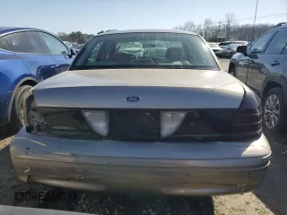 2005 Ford Police Interceptor z VIN 2FAFP71W15X156970, wystawiony jako Copart lot #48757325 z przebiegiem 187 004 mil mil oraz Czysty tytuł • Clean title. Historia ofert i sprzedaży dostępna na DreamBid. Obrazek 6.