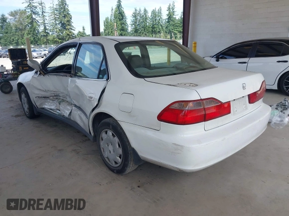 1998 Honda Accord LX with VIN 1HGCG5640WA004358, listed as a IAAI auction lot 42643808 with Not provided miles and . Bid and sale history available at DreamBid. Image 3.