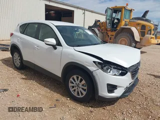 2016 Mazda CX-5 Sport with VIN JM3KE2BYXG0683318, listed as a IAAI auction lot 41777751 with 116,922 mi miles. Bid and sale history available at carsss.com. Image 1.