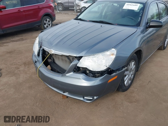 2008 Chrysler Sebring LX z VIN 1C3LC46K38N156346, wystawiony jako IAAI lot #40965609 z przebiegiem Nie podano mil oraz . Historia ofert i sprzedaży dostępna na DreamBid. Obrazek 6.