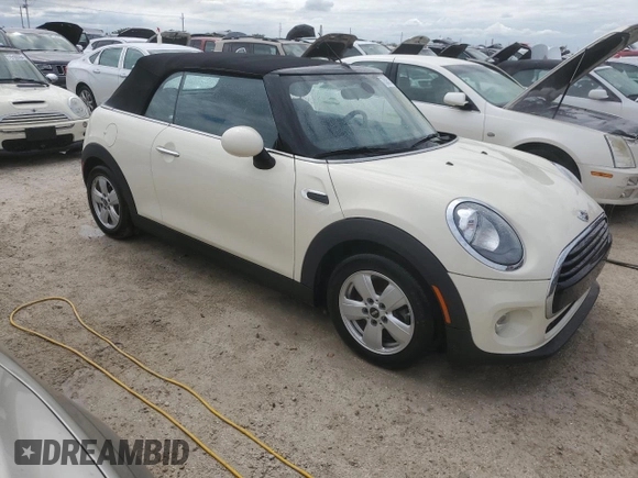 2017 MINI Convertible Cooper z VIN WMWWG5C38H3C99627, wystawiony jako Copart lot #75053914 z przebiegiem 42 087 mil mil oraz Nie do naprawy • Non repairable. Historia ofert i sprzedaży dostępna na DreamBid. Obrazek 4.