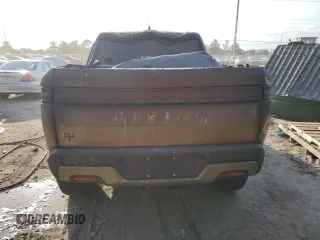 2023 Rivian R1T Adventure z VIN 7FCTGBAA6PN028517, wystawiony jako Copart lot #73712354 z przebiegiem Nie podano mil oraz Nie do naprawy. Historia ofert i sprzedaży dostępna na DreamBid. Obrazek 6.