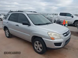 2009 Kia Sportage LX with VIN KNDJF724097567390, listed as a IAAI auction lot 42066762 with 159,946 mi miles. Bid and sale history available at carsss.com. Image 1.