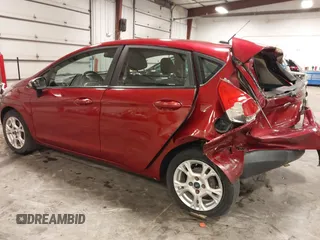 2016 Ford Fiesta SE with VIN 3FADP4EJ4GM114764, listed as a IAAI auction lot 40164385 with 144,336 mi miles. Bid and sale history available at carsss.com. Image 3.