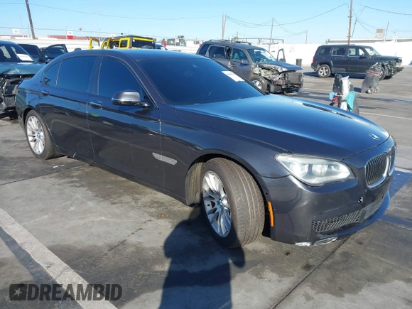 2015 BMW 7 Series 750Li with VIN WBAYE8C52FD780902, listed as a IAAI auction lot 40808265 with 102,774 mi miles. Bid and sale history available at carsss.com. Image 1.