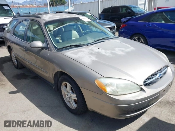 2002 Ford Taurus z VIN 1FAHP59U52G115825, wystawiony jako IAAI lot #41904552 z przebiegiem 91 004 mil mil oraz . Historia ofert i sprzedaży dostępna na DreamBid. Obrazek 1.