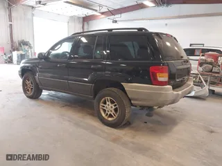 2002 Jeep Grand Cherokee Laredo with VIN 1J4GW48SX2C118434, listed as a IAAI auction lot 42036464 with 187,263 mi miles. Bid and sale history available at carsss.com. Image 3.