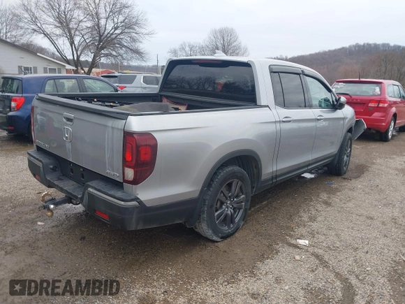 2020 Honda Ridgeline Sport with VIN 5FPYK3F13LB023123, listed as a IAAI auction lot 41694273 with 51,934 mi miles and . Bid and sale history available at DreamBid. Image 4.