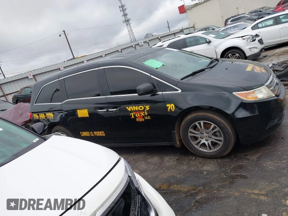 2012 Honda Odyssey EX-L with VIN 5FNRL5H64CB142247, listed as a IAAI auction lot 41722015 with 179,637 mi miles and . Bid and sale history available at carsss.com. Image 13.