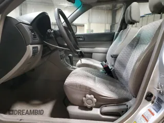 2003 Subaru Forester XS with VIN JF1SG65673H714885, listed as a Copart auction lot 74063684 with 298,649 mi miles and Salvage Title. Bid and sale history available at carsss.com. Image 7.