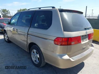 2001 Honda Odyssey EX with VIN 2HKRL18681H530346, listed as a IAAI auction lot 42371126 with 211,604 mi miles and . Bid and sale history available at DreamBid. Image 3.