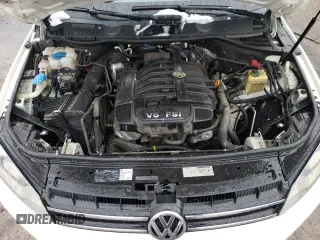 2011 Volkswagen Touareg Sport with VIN WVGFF9BP8BD002982, listed as a Copart auction lot 53958555 with 156,742 mi miles and Salvage Title. Bid and sale history available at DreamBid. Image 12.
