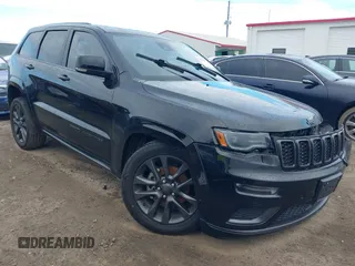2018 Jeep Grand Cherokee High Altitude z VIN 1C4RJECG4JC247189, wystawiony jako IAAI lot #41672715 z przebiegiem 107 005 mil mil oraz . Historia ofert i sprzedaży dostępna na DreamBid. Obrazek 1.