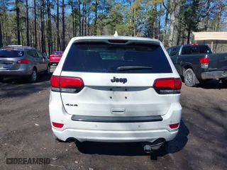 2015 Jeep Grand Cherokee Altitude with VIN 1C4RJFAG4FC924869, listed as a IAAI auction lot 41656444 with 112,786 mi miles. Bid and sale history available at carsss.com. Image 16.