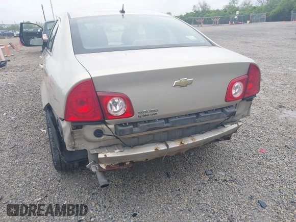 2011 Chevrolet Malibu 1LS with VIN 1G1ZB5E14BF326893, listed as a IAAI auction lot 42175943 with 163,887 mi miles and . Bid and sale history available at DreamBid. Image 6.