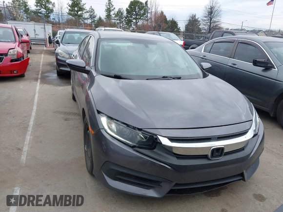 2017 Honda Civic LX with VIN 19XFC2F52HE233607, listed as a IAAI auction lot 41758632 with 159,290 mi miles and . Bid and sale history available at DreamBid. Image 12.