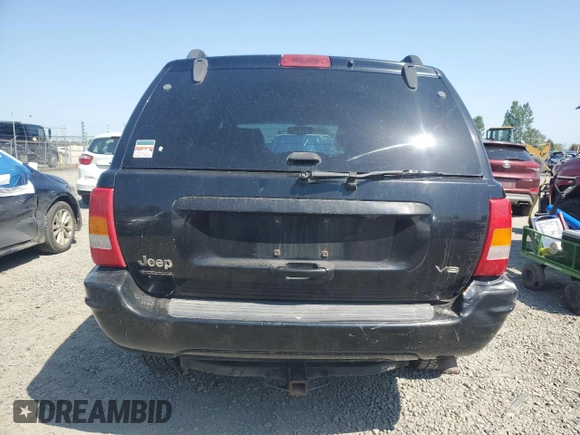 2002 Jeep Grand Cherokee Limited with VIN 1J8GW58NX2C158544, listed as a Copart auction lot 54937665 with 259,089 mi miles and Salvage title. Bid and sale history available at DreamBid. Image 6.