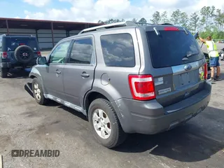 2011 Ford Escape Limited with VIN 1FMCU9EG2BKC55005, listed as a IAAI auction lot 41958212 with 188,182 mi miles. Bid and sale history available at carsss.com. Image 3.