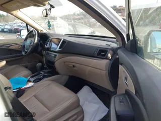 2016 Honda Pilot EX-L with VIN 5FNYF6H59GB025365, listed as a IAAI auction lot 41118130 with 141,530 mi miles. Bid and sale history available at carsss.com. Image 5.