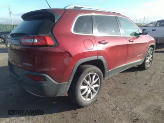2014 Jeep Cherokee Limited with VIN 1C4PJMDB7EW165272, listed as a IAAI auction lot 35106260 with 102,934 mi miles and . Bid and sale history available at DreamBid. Image 4.