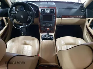 2012 Maserati Quattroporte S z VIN ZAM39JKAXC0065906, wystawiony jako Copart lot #52009945 z przebiegiem 55 058 mil mil oraz Szkody całkowita. Historia ofert i sprzedaży dostępna na DreamBid. Obrazek 8.