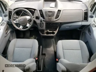 2016 Ford Transit Cargo z VIN 1FTYR2CM5GKB15310, wystawiony jako Copart lot #59266185 z przebiegiem 64 352 mil mil oraz Tytuł czysty. Historia ofert i sprzedaży dostępna na DreamBid. Obrazek 8.