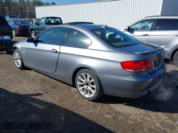 2009 BMW 3 Series 335i xDrive with VIN WBAWC73519E269820, listed as a IAAI auction lot 41794929 with 122,691 mi miles. Bid and sale history available at carsss.com. Image 3.